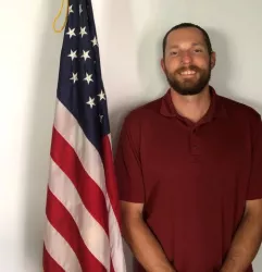 Trustee Bryan Flax